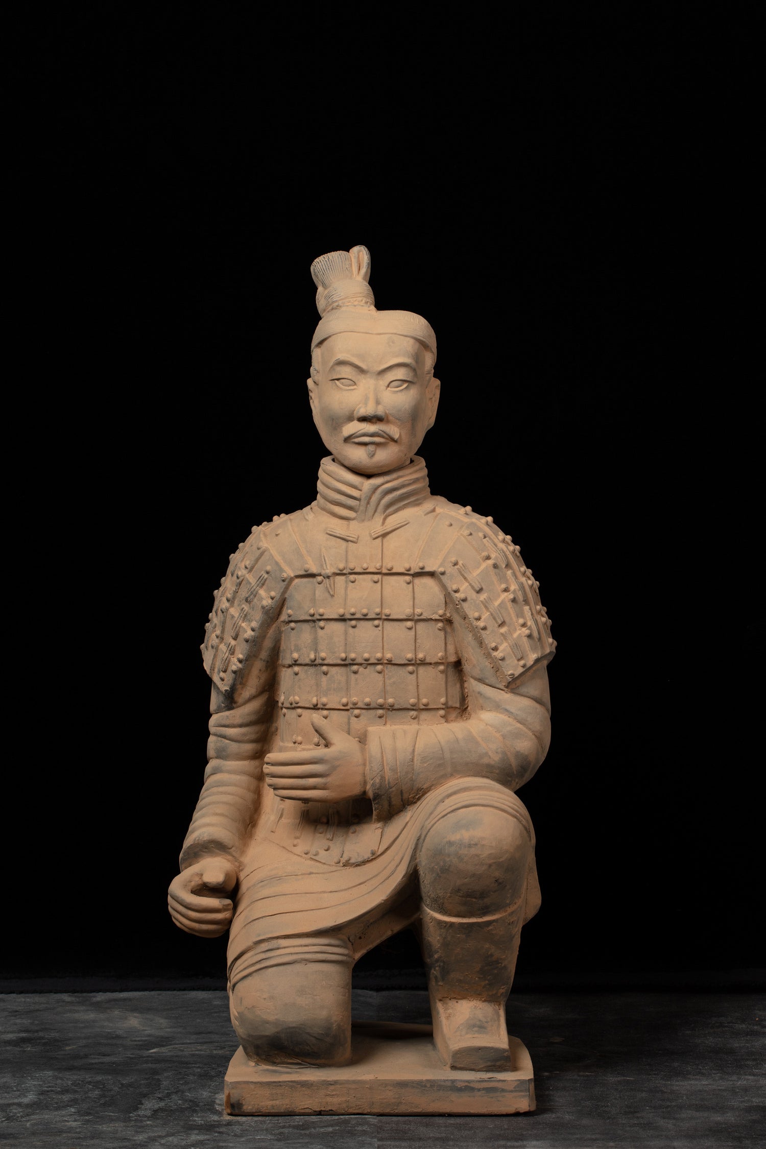 1.2M Kneeling Archer - CLAYARMY-Front view of the 1.2M Kneeling Archer sculpture, showcasing detailed facial features and hand-painted armor.