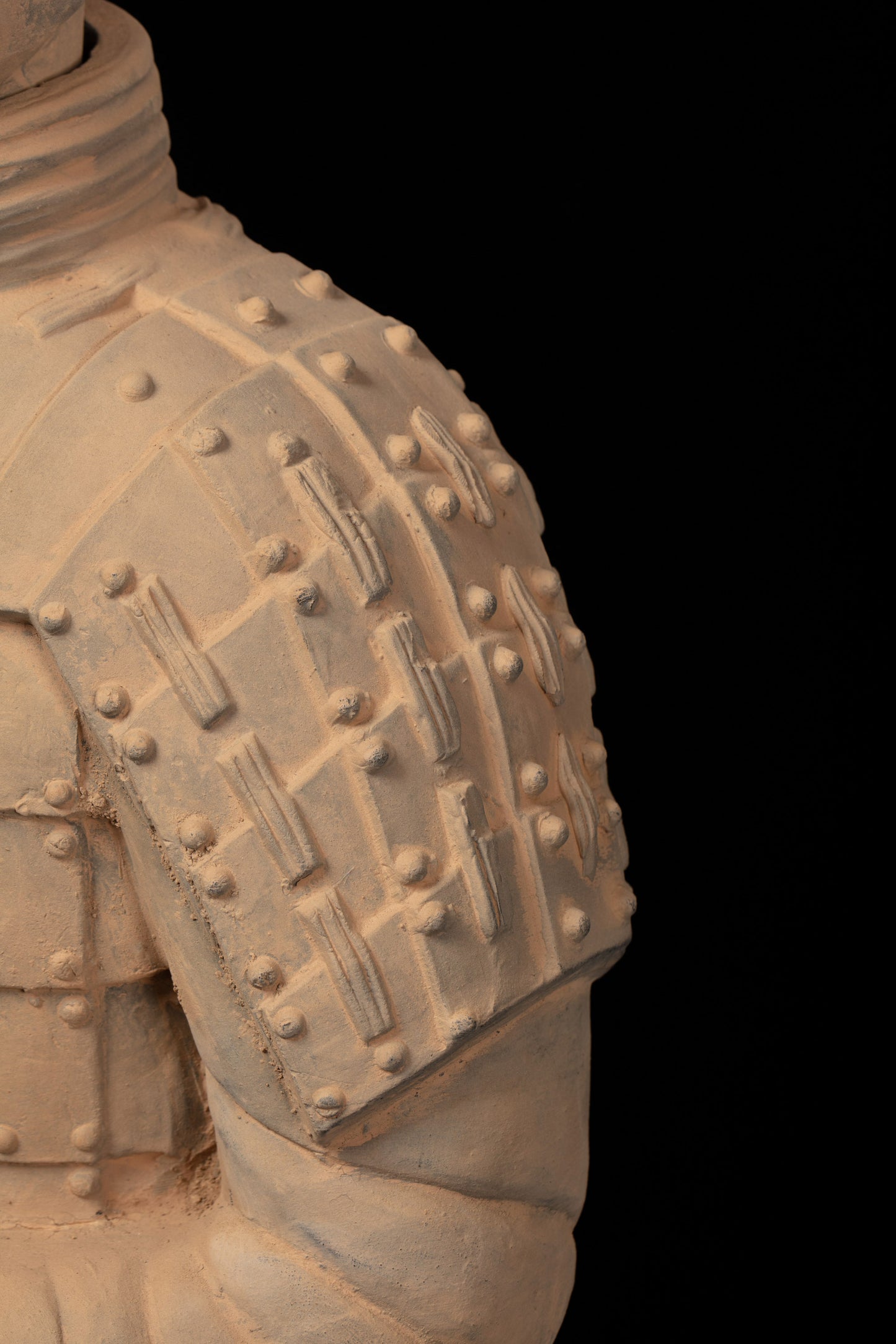 1.2M Kneeling Archer - CLAYARMY-Detail shot of the base and handcrafted elements on the 1.2M Kneeling Archer.