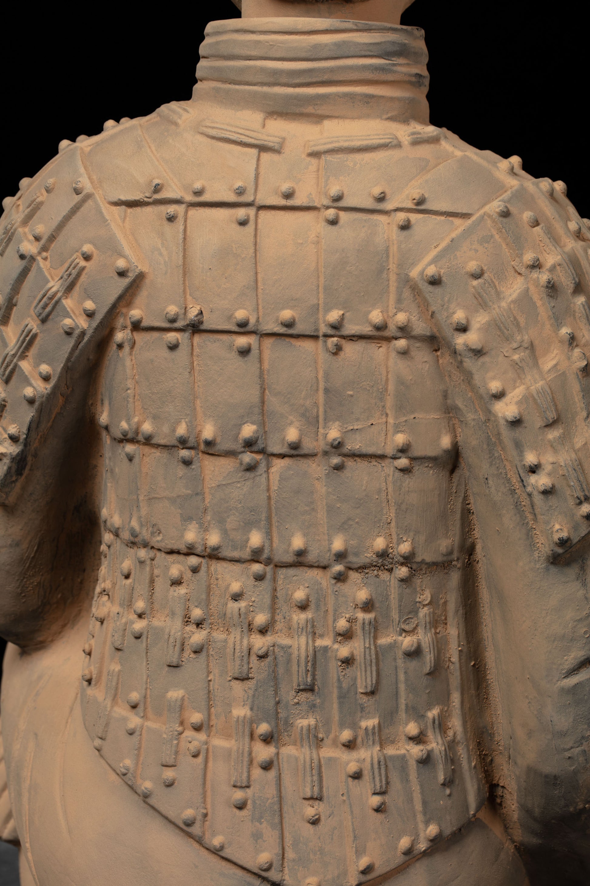 1.2M Kneeling Archer - CLAYARMY-Back view focusing on the sculpted robe and accessories with vibrant colors on the 1.2M Kneeling Archer.