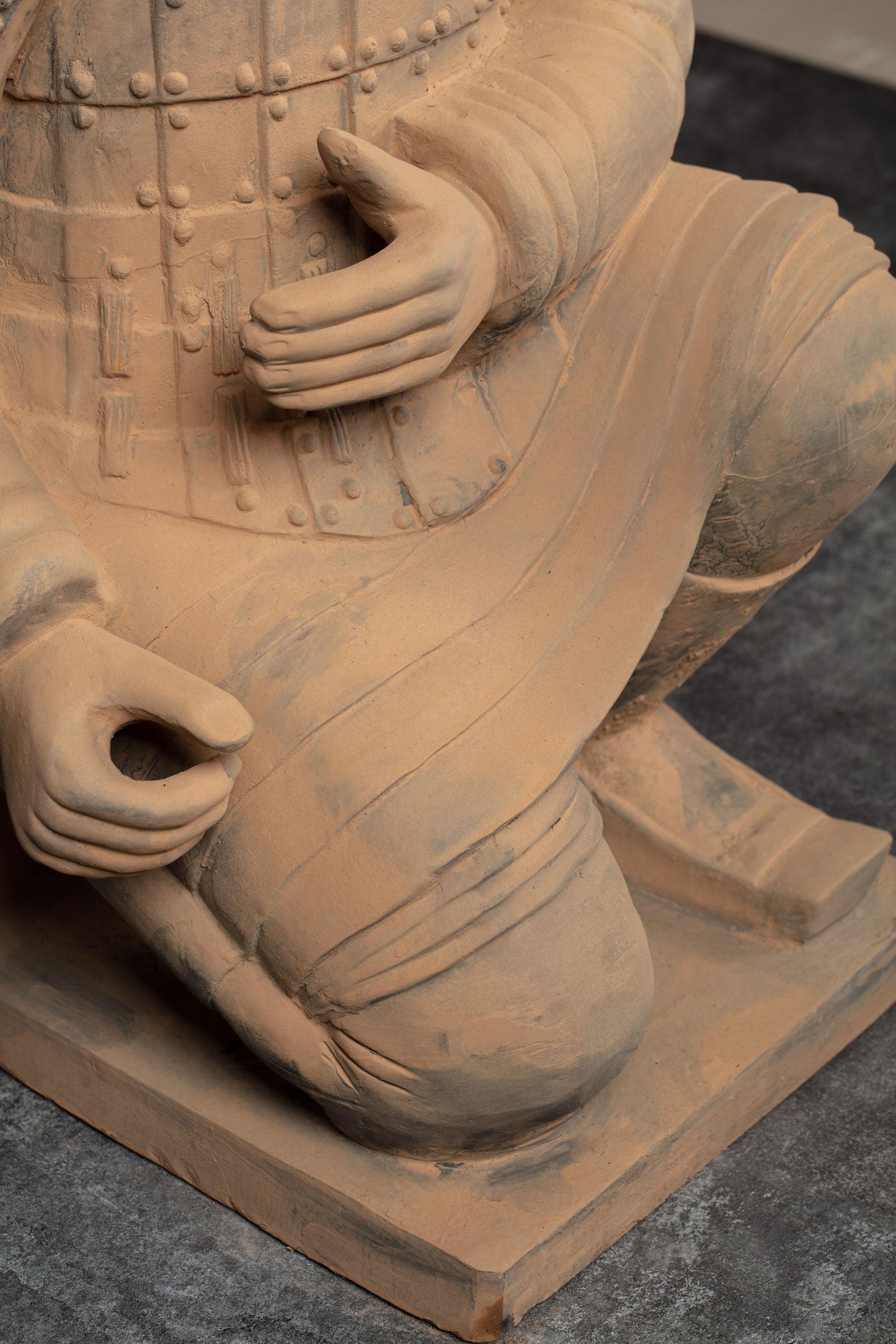 1.2M Kneeling Archer - CLAYARMY-Aerial perspective capturing the entire sculpture and its surroundings.