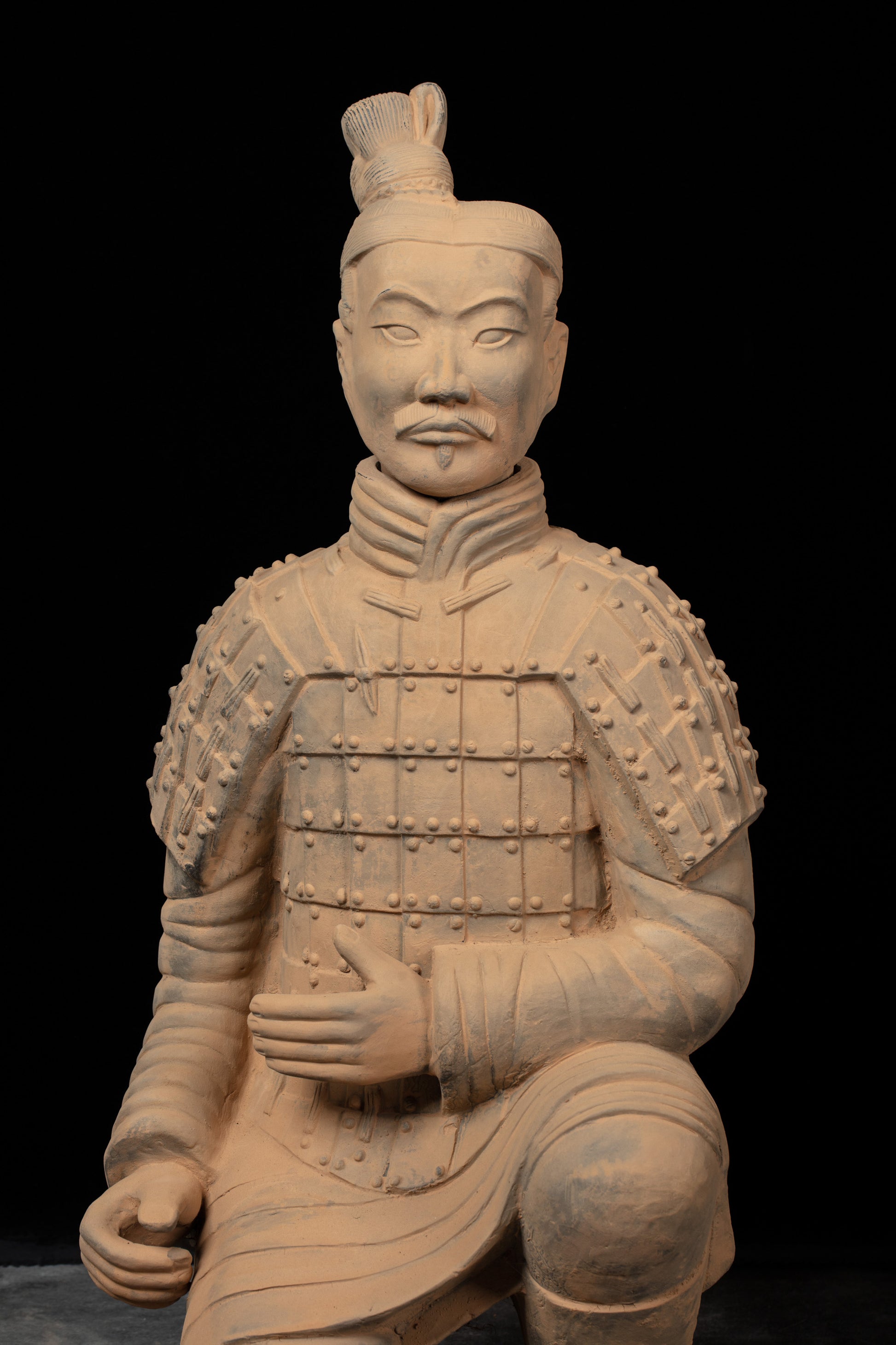 1.2M Kneeling Archer - CLAYARMY-Front view of the 1.2M Kneeling Archer sculpture, showcasing detailed facial features and hand-painted armor.