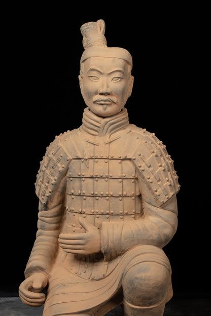 1.2M Kneeling Archer - CLAYARMY-Front view of the 1.2M Kneeling Archer sculpture, showcasing detailed facial features and hand-painted armor.