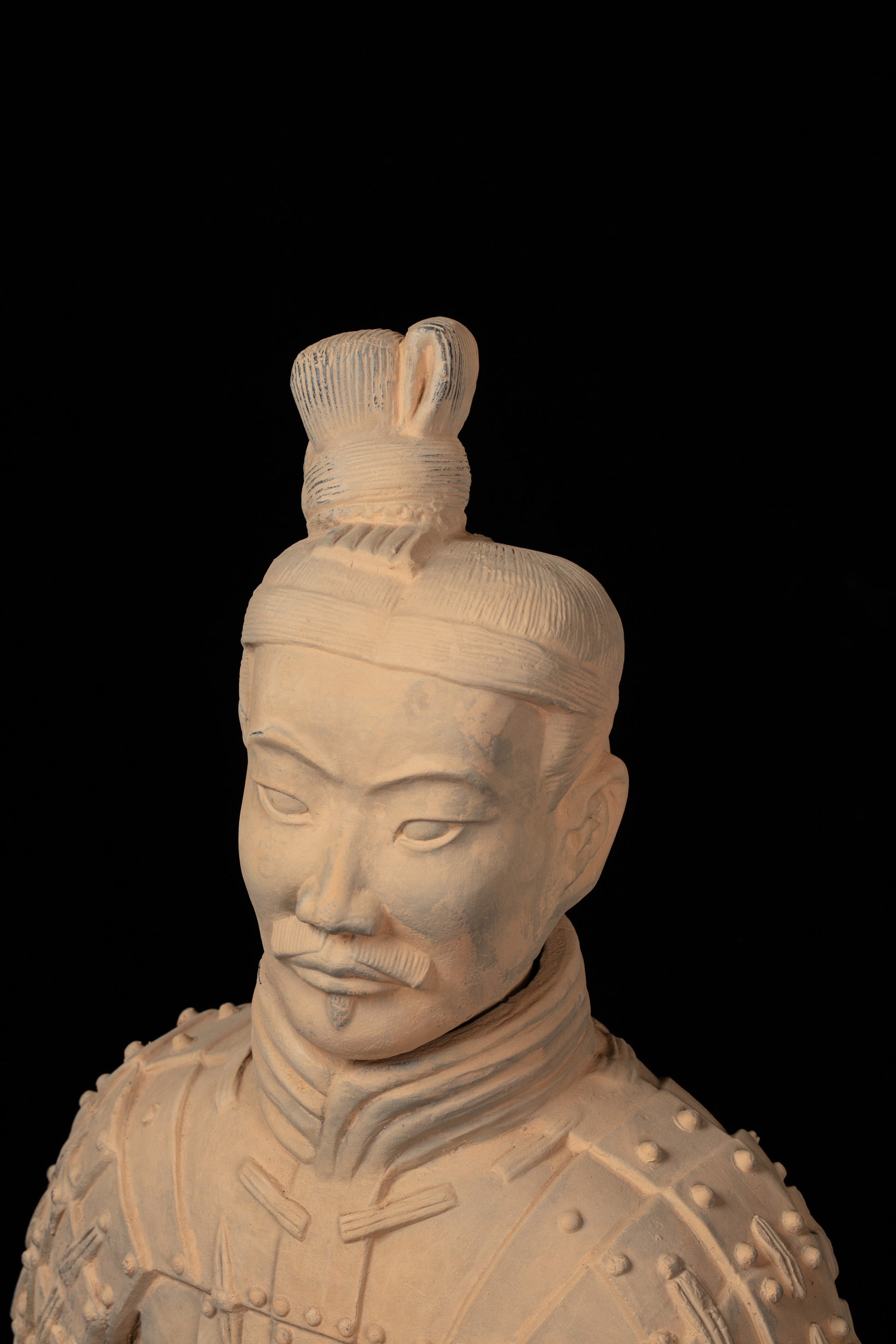 1.2M Kneeling Archer - CLAYARMY-Zoomed-in view of the face, highlighting intricate facial features and expressions on the 70CM Kneeling Archer.